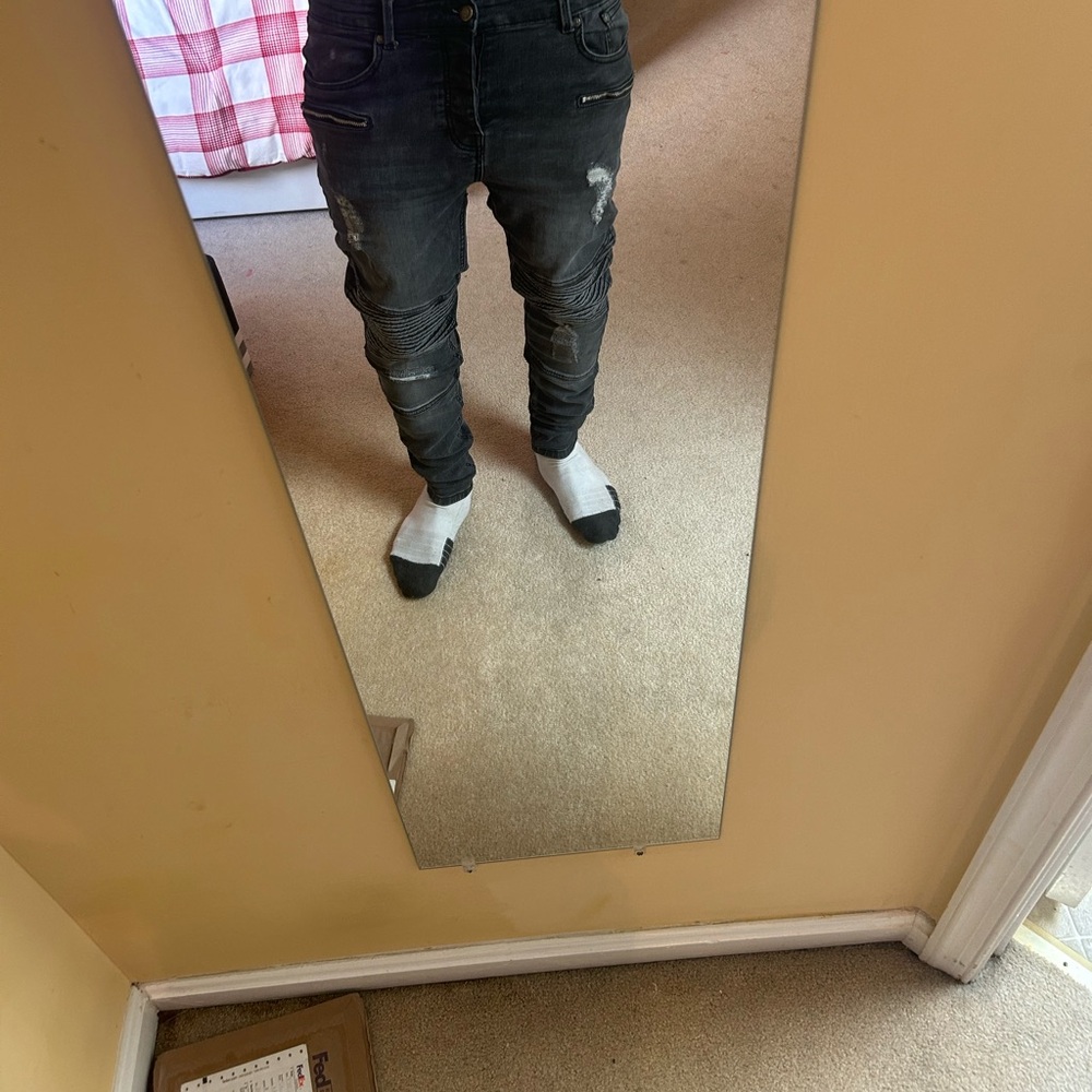 Black Distressed ripped slim fit “skinny” jeans